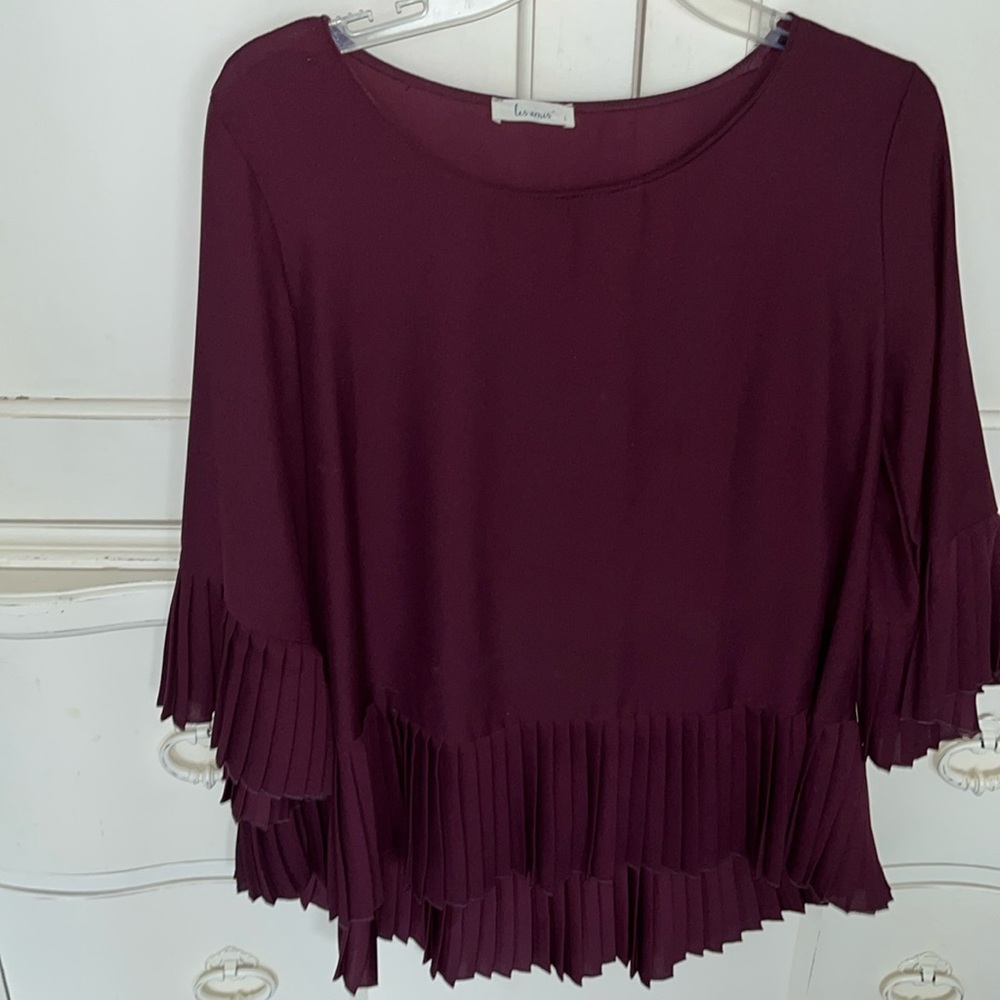Women’s size L blouse/tunic Burgandy. Longer in the back. 100% polyester